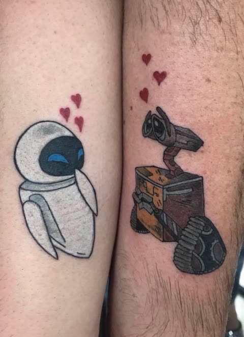 Matching robot couple tattoos with little red hearts, full color, on two arms