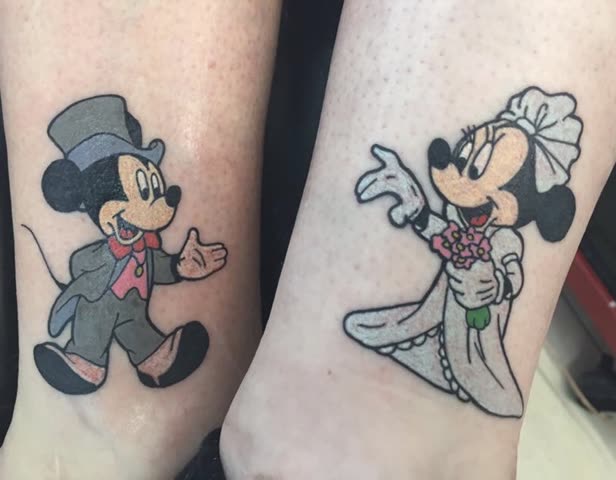 Matching cartoon mouse bride and groom tattoos, full color, on two ankles